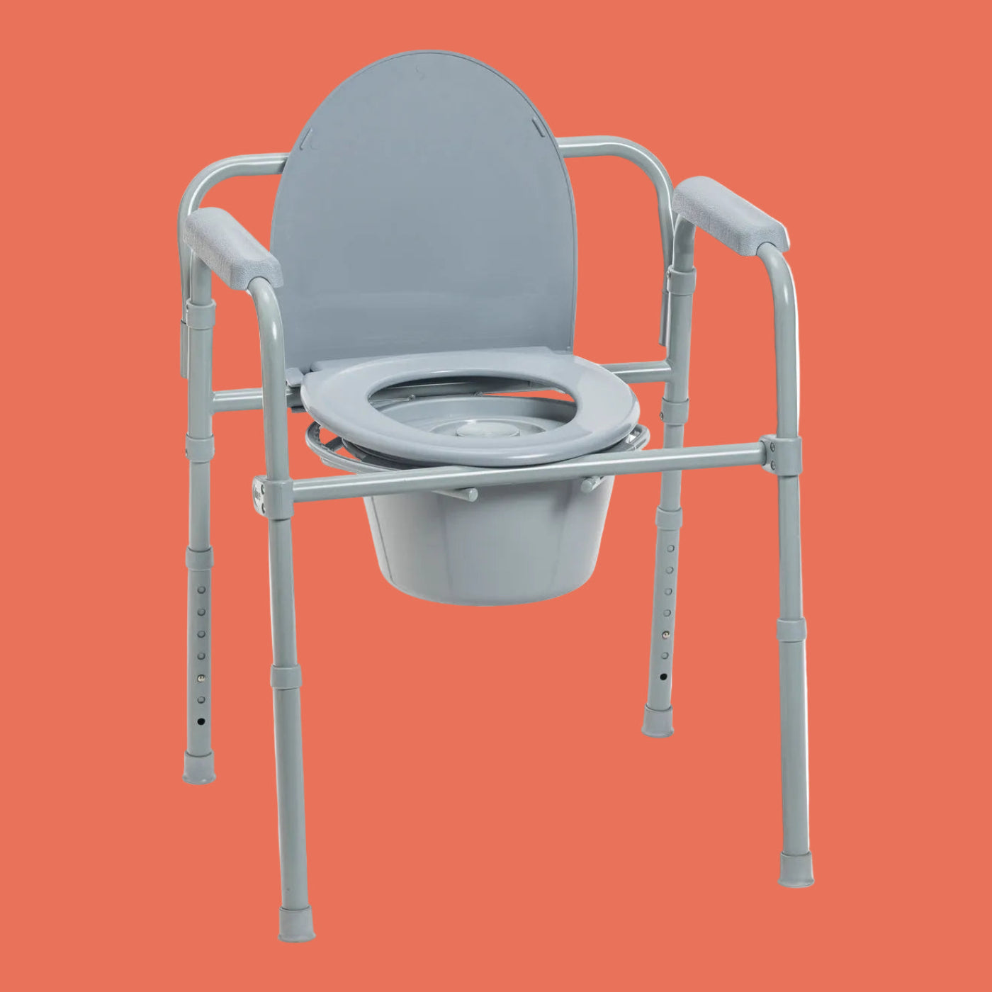Gray commode chair with adjustable legs on a white background