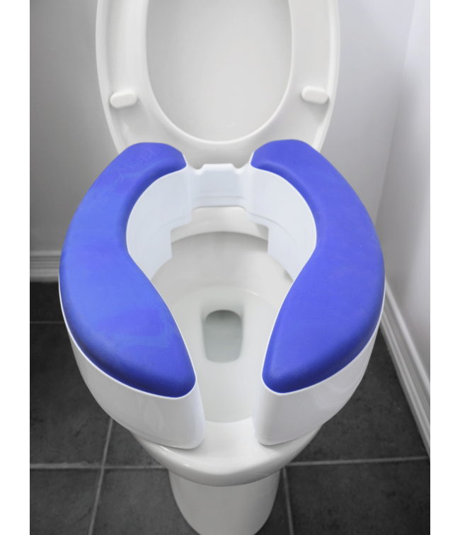 Raised toilet seat installed on toilet bowl, top view
