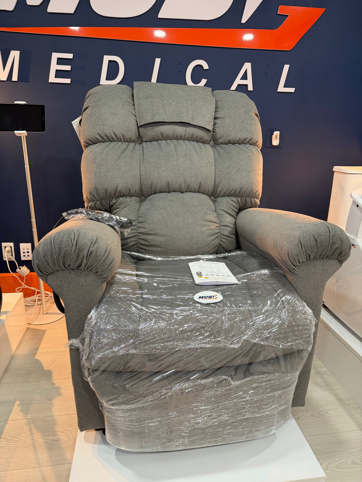Golden Technologies Cloud Classic PR510-MLA power lift chair, grey, side view in the Must Medical showroom