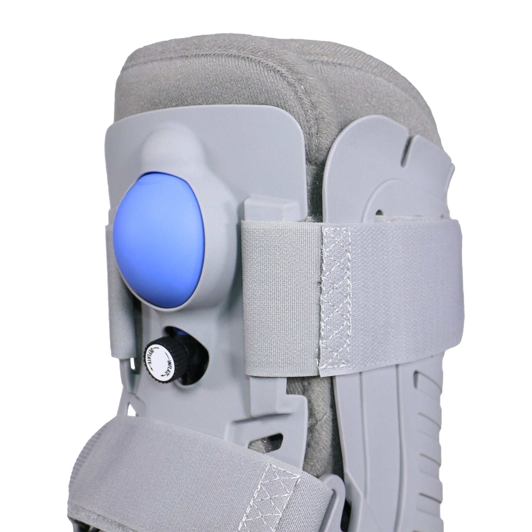 Closeup detail of grey air CAM walking boot showing blue pneumatic air bladder, black inflate/deflate valve, padded collar lining, and velcro strap — side detail view of adjustable air compression system