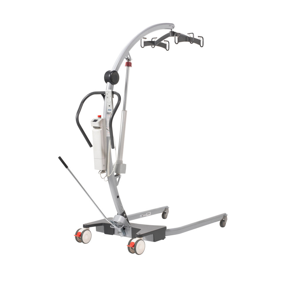Drive Levantar electric floor lift 3/4 angle view with base spread open, curved boom arm, sling bar hooks, electric motor unit, manual spread lever, and locking casters — available at Must in Metro Vancouver