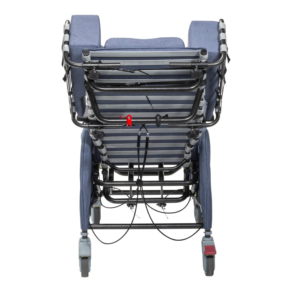 Rear view of Drive tilt-and-recline chair in tilted position showing steel frame, cable mechanism, lateral headrest supports, and casters with blue upholstery