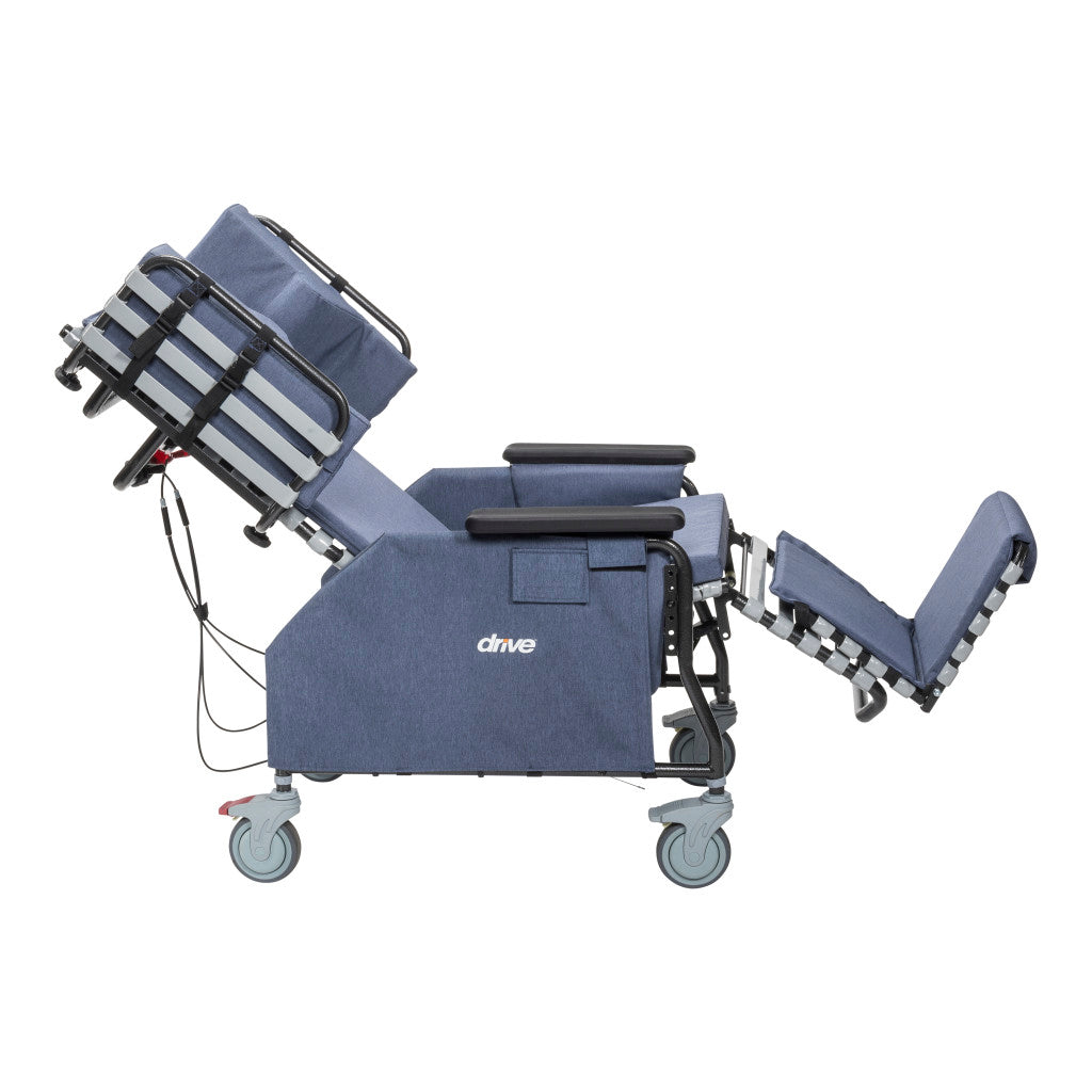 Drive tilt-and-recline chair side view in fully tilted position with leg rest raised, casters, and blue upholstery