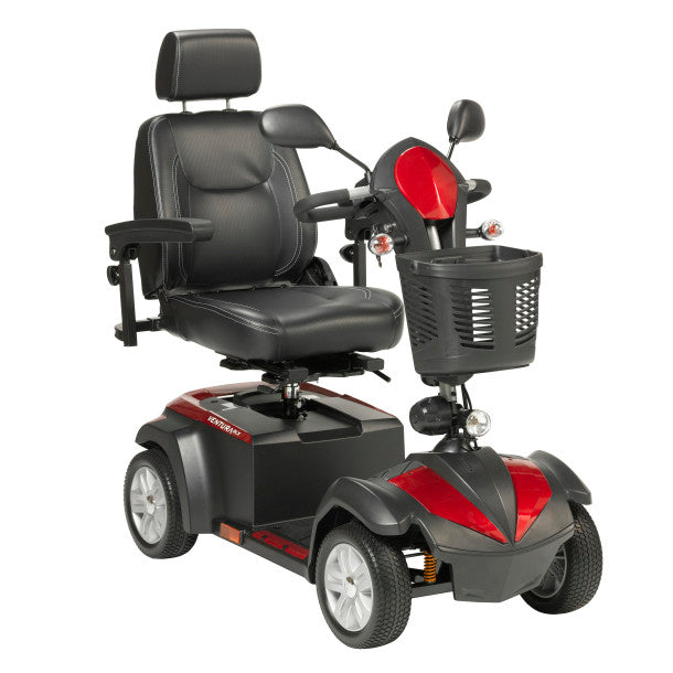 Drive Ventura DLX 4-wheel mobility scooter in red and black, 3-quarter front angle showing high-back captain seat, headrest, armrests, tiller, front basket, and suspension springs
