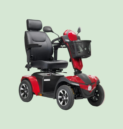 Drive Viper mobility scooter in red on orange background, 3-quarter angle showing full body profile, swivel captain seat, and front storage basket