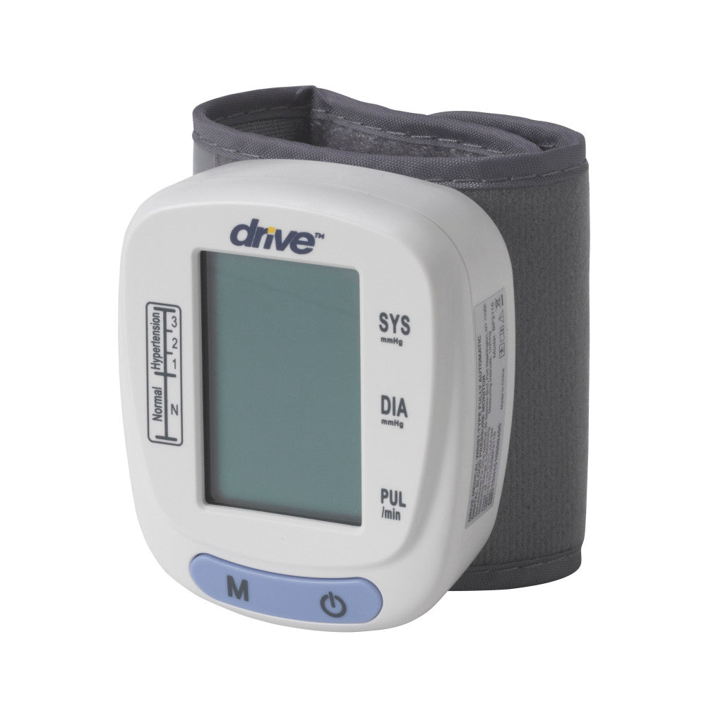 Drive automatic wrist blood pressure monitor front view with grey cuff, blank LCD display, memory and power buttons — available at Must in Metro Vancouver