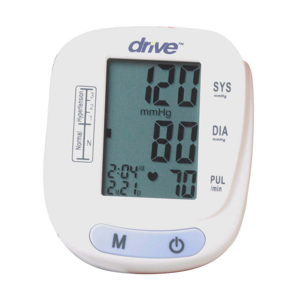 Close-up of Drive wrist blood pressure monitor LCD display showing 120 systolic, 80 diastolic, and 70 pulse readings with hypertension indicator scale