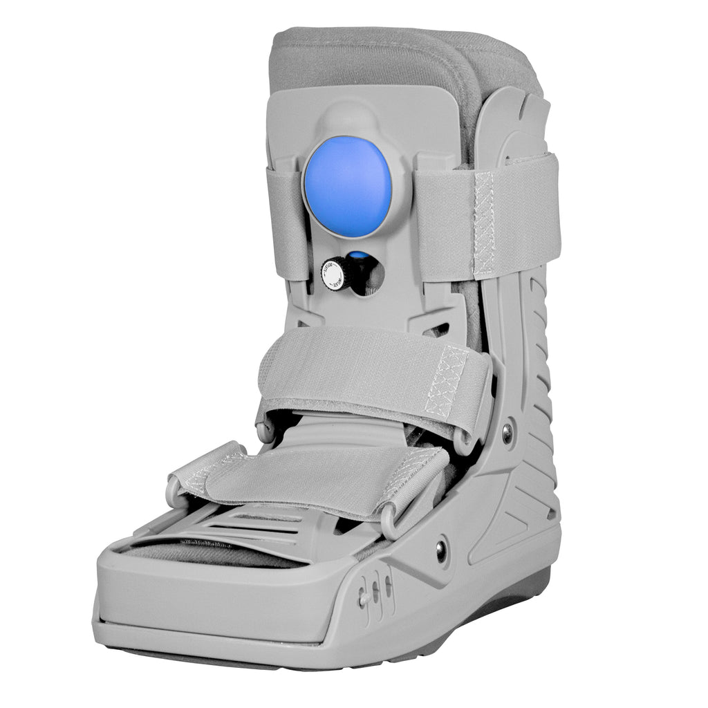 Grey short pneumatic air CAM walking boot with blue air pump bladder, rigid vented shell, padded liner, velcro straps, and rocker sole — front angled view showing full ankle and foot immobilization boot design