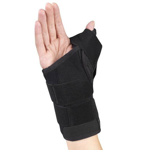OTC 2387 wrist-thumb splint worn on right hand, palm-side view showing soft fabric wrap, two velcro closure straps, thumb spica channel with open thumb tip, and low-profile wrist support
