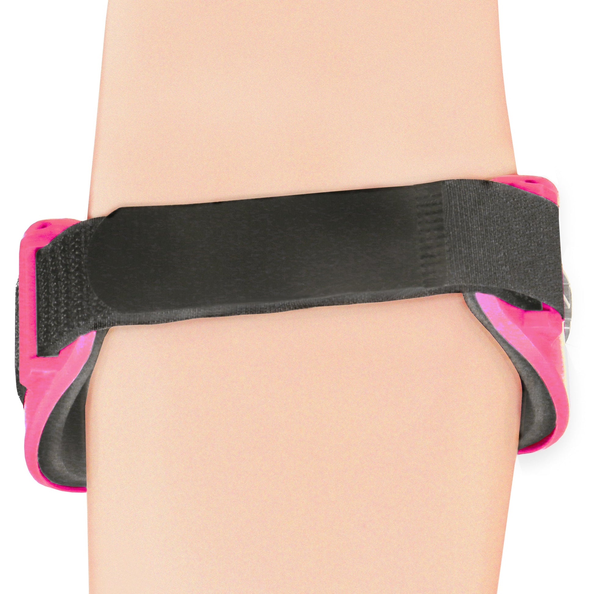 Inner skin-contact side of OTC 2421 tennis elbow brace in pink showing black foam padding insert inside pink butterfly-wing hard shell frame, wide elastic strap, and velcro closure tab

