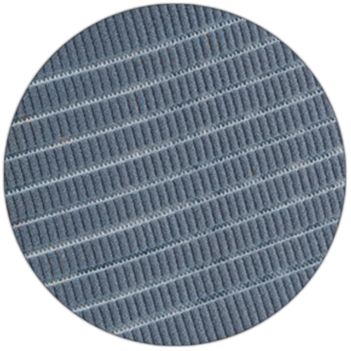 Close-up circle crop fabric swatch of OTC 2882 Theratex lumbosacral support showing diagonal ribbed weave texture and four-way stretch knit construction in slate grey
