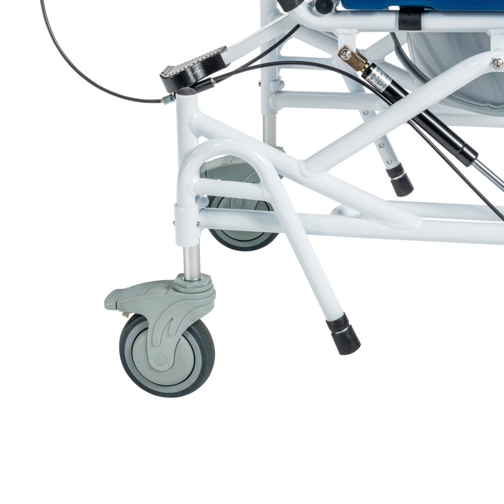 Close-up of rehab shower chair base showing swivel locking caster, tilt cable mechanism, gas spring strut, cross-brace frame, and anti-tip rubber leg