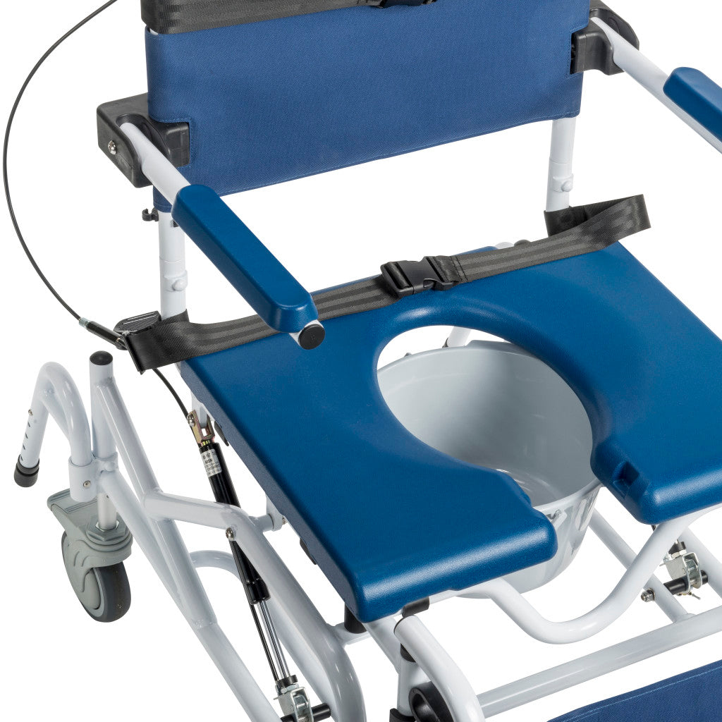 Close-up of rehab shower commode chair showing blue padded open commode seat cutout, safety lap belt with buckle, tilt cable mechanism, and locking caster