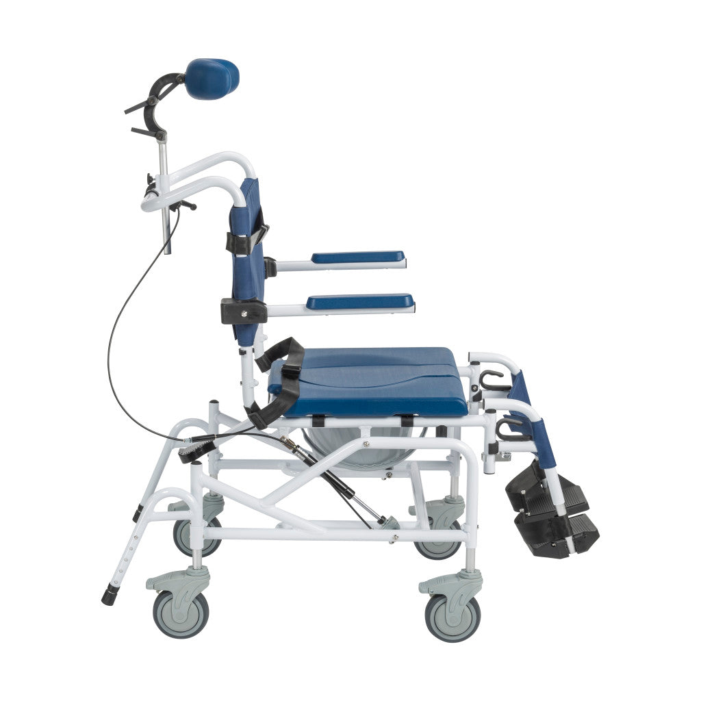 Full side view of tilting rehab shower commode chair in upright position showing adjustable headrest, lateral supports, padded blue backrest, armrests, seat with lap belt, commode bucket, leg rest, foot support, and four swivel locking casters — available at Must in Metro Vancouver