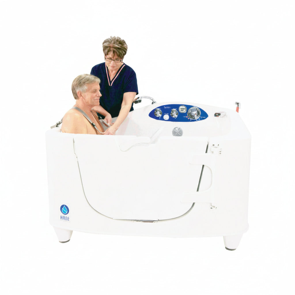 Rane Colorado Spring walk-in bathtub with side entry door, shown with care provider assisting user during bathing, white finish with blue control panel